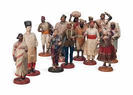 A GROUP OF FOURTEEN INDIAN TERRACOTTA FIGURES